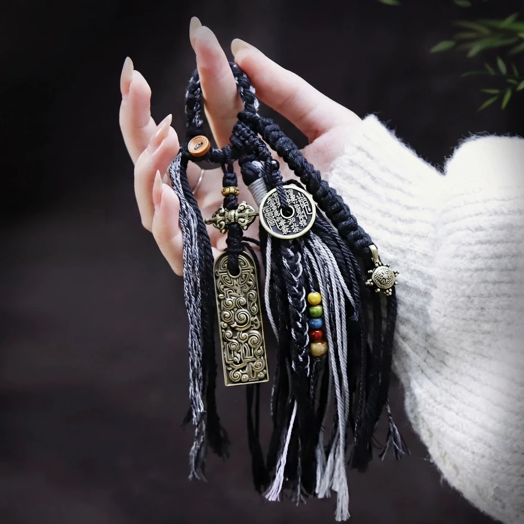 Spirit of the Himalayas: Authentic Handmade Tibetan Good Luck Tassel Charm regular dark blue