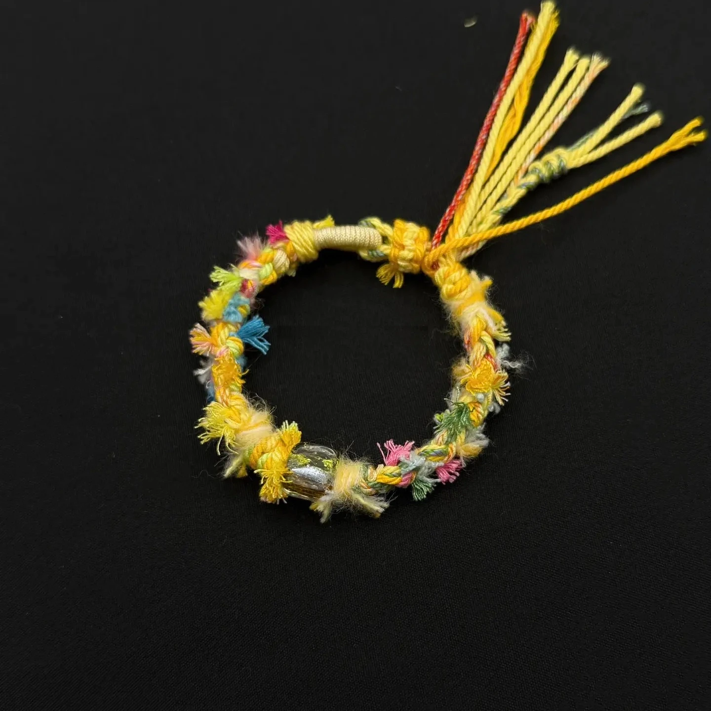 Himalayan Blessing: Handwoven Tibetan Lucky Knot Bracelet with Sacred Charms regular lemon