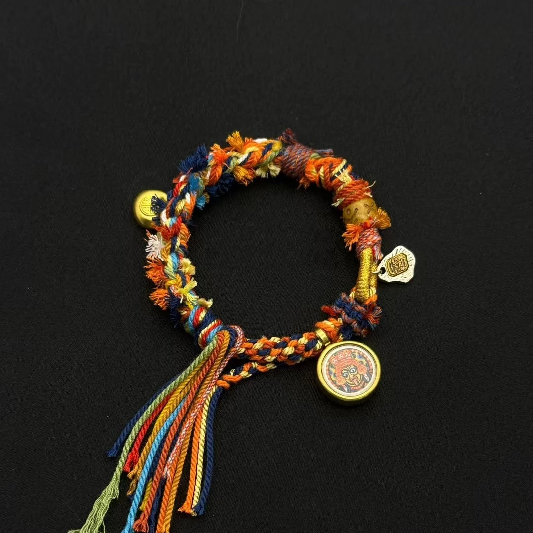 Himalayan Blessing: Handwoven Tibetan Lucky Knot Bracelet with Sacred Charms regular sunny