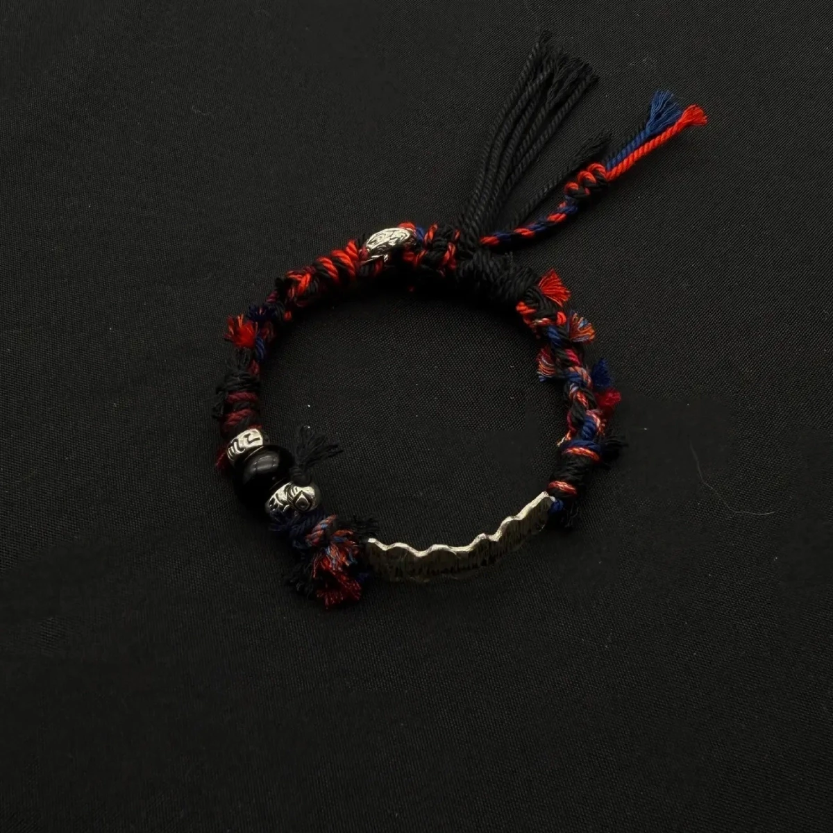 Himalayan Blessing: Handwoven Tibetan Lucky Knot Bracelet with Sacred Charms regular guge kingdom